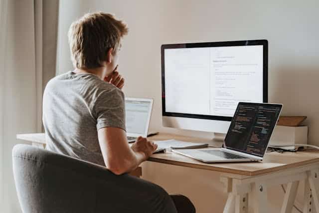 student is stuck on coding assignment and looking at the screen